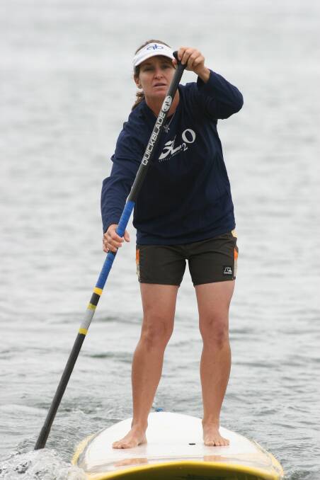 CHAMPIONS: Olympian Lanee Butler-Beashel, pictured training on a stand-up paddle board near her home at Balcolyn, is co-hosting the new sailing academy. Picture: David Stewart