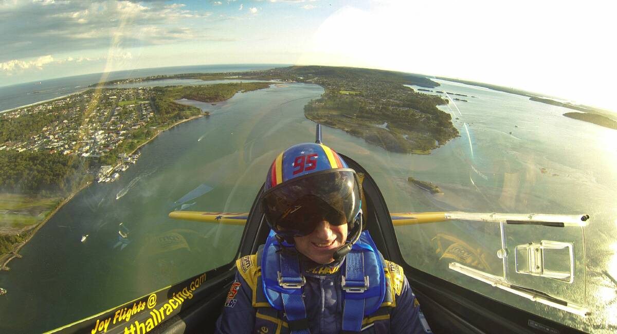 LOCAL HOPE: Matt Hall flying over Lake Macquarie from Lake Macquarie Airport.