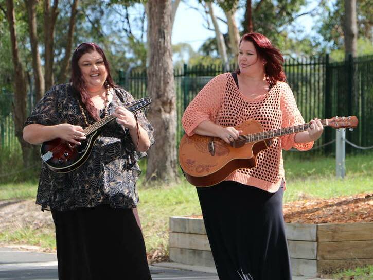LOCAL GIRLS: Cec van der Kamp, left, and Em Palmer are The Rough Diamonds. See them in concert at Morisset Country Club this Sunday from 1pm. Picture: David Stewart.