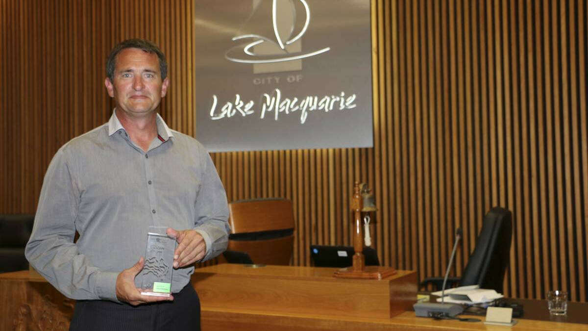 RECOGNISED: David Helmers, won the 2014 Lake Macquarie Australia Day Award for Citizen of the Year for his work with Australian Men's Shed Association. Picture: Jamieson Murphy