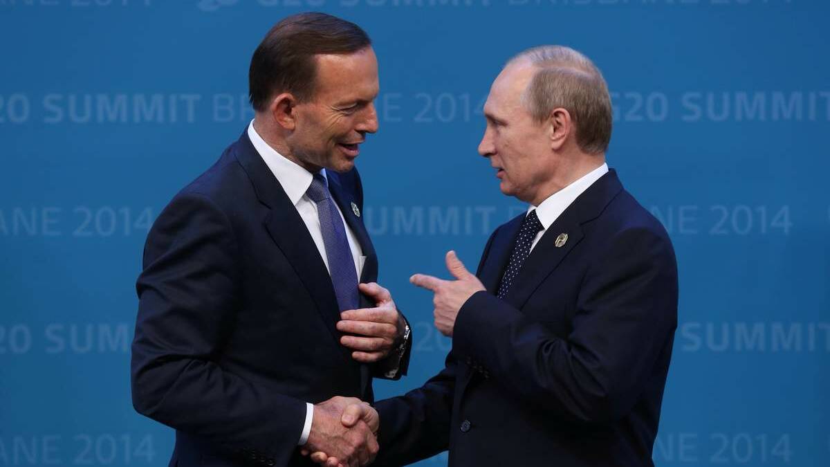 TALKING TERMS: Tony Abbott with Russia President Vladimir Putin at the recent G20 summit in Brisband. Picture: Andrew Meares.