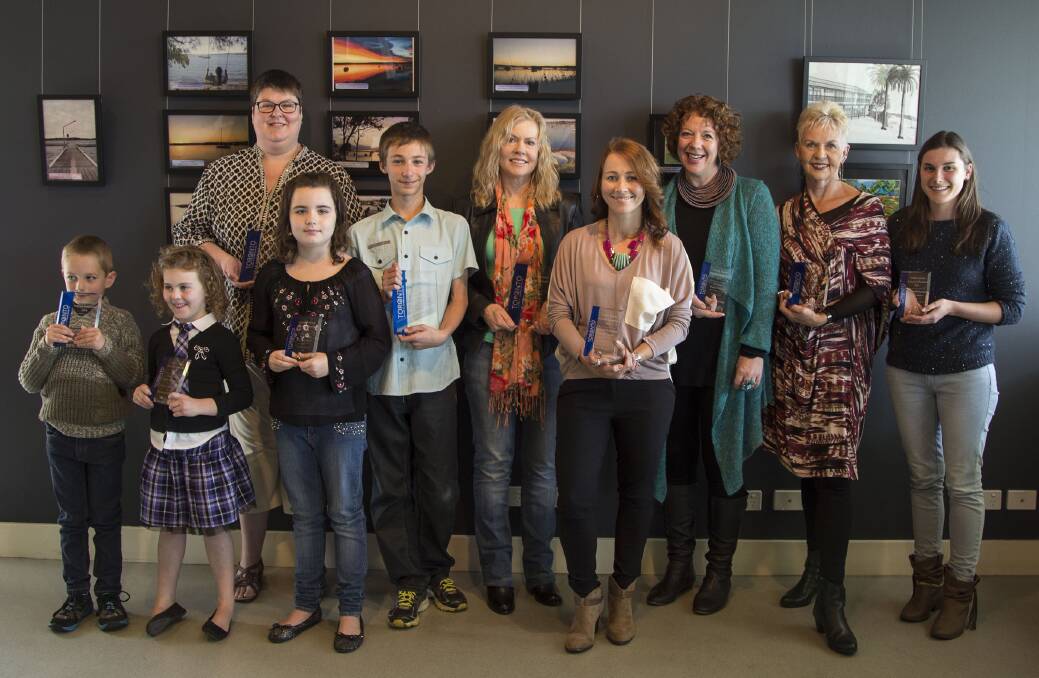 PRESENTATION: Some of the winners with their awards at Lake Macquarie City Art Gallery.