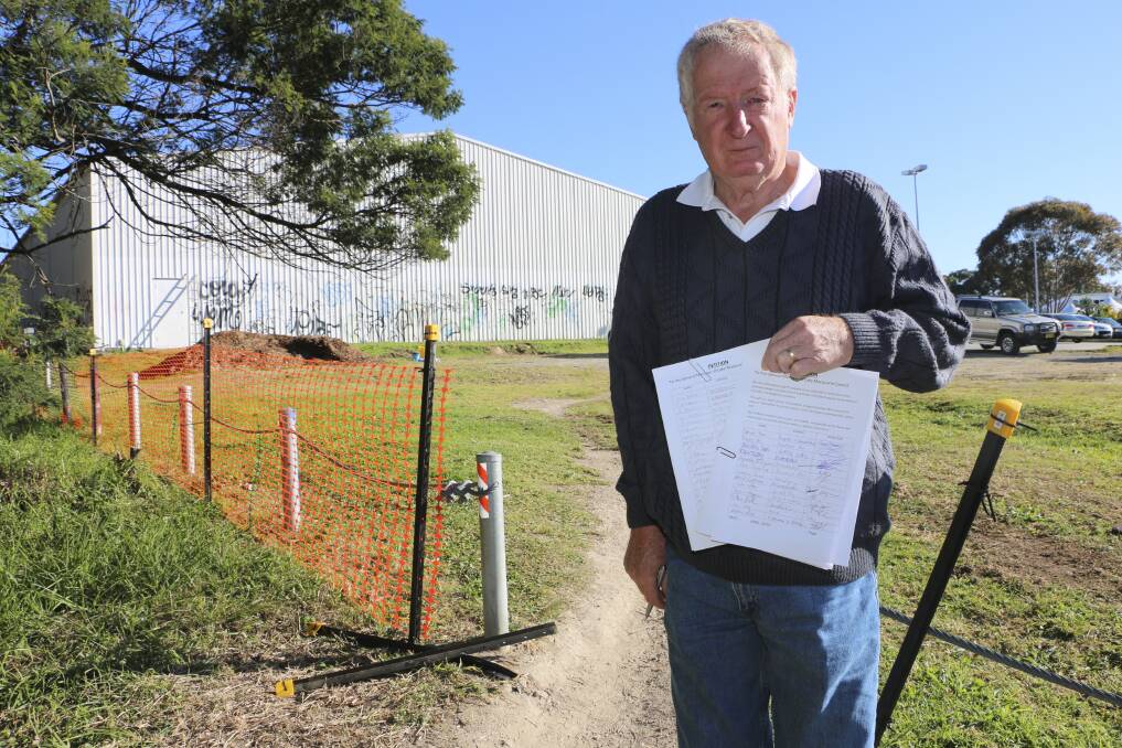 TROUBLE SPOT: Letter writer Phillip Blease at the Bonnells Bay path. Picture: Jamieson Murphy
