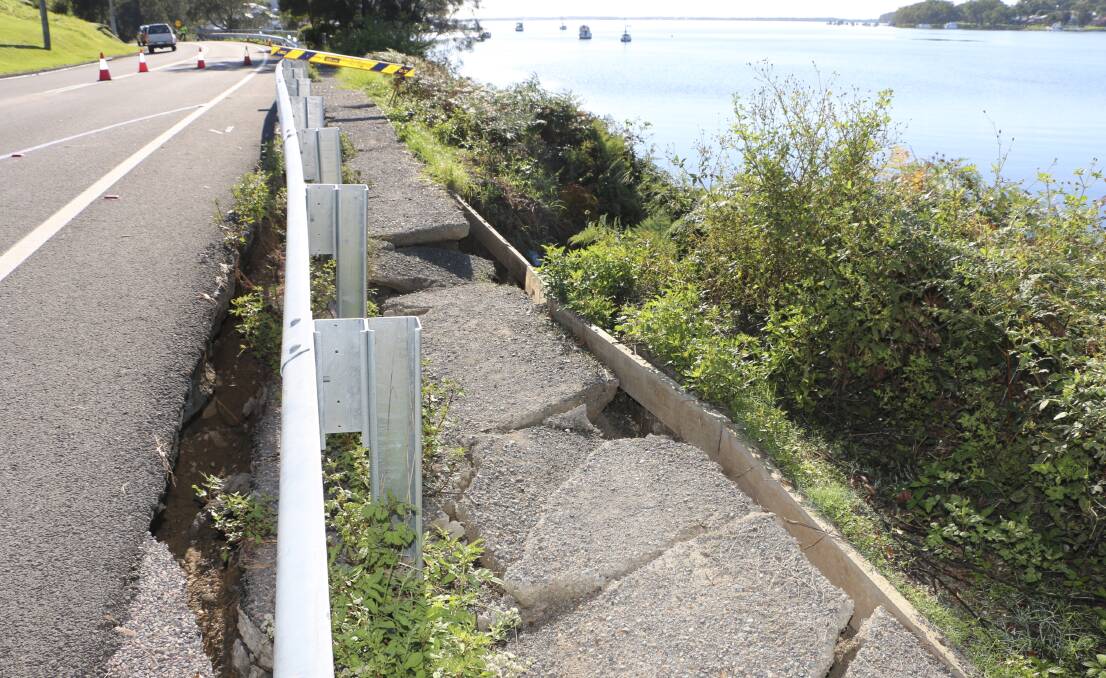 COLLAPSE: A section of the damaged bank and road edge at Arcadia Vale. Picture: Jamieson Murphy