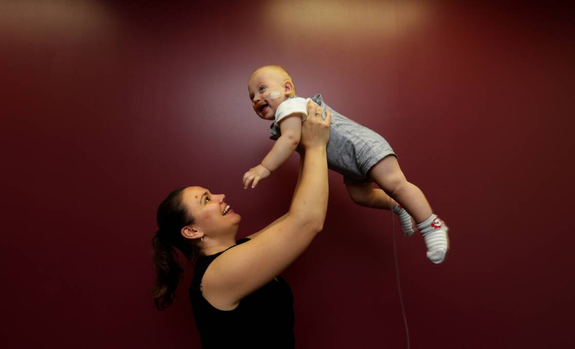 MIRACLE BABY: Claire Earp with her son Malakai, at John Hunter Hospital, Rankin Park. Picutre: Jonathan Carroll
