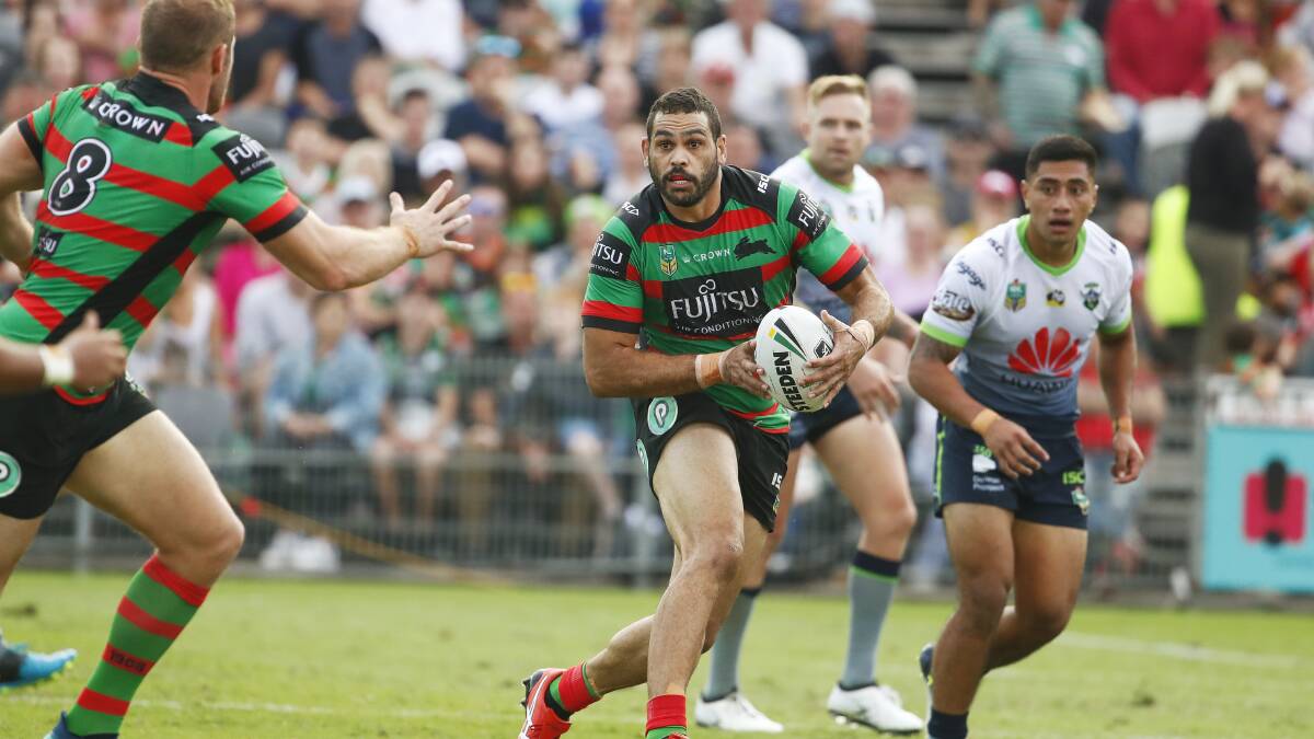 RED & GREEN: Greg Inglis and the South Sydney Rabbitohs put on a show in front of more than 15,000 loyal fans at Central Coast Stadium as they downed the Canberra Raiders. Picture: Daniel Munoz/AAP