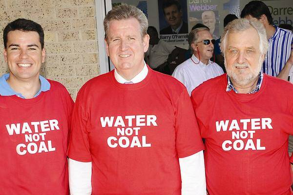 MESSAGE: The then Opposition Leader Barry O'Farrell (centre) wears the t-shirt that the Wyong mayor Bob Graham clearly remembers prior to the state election.