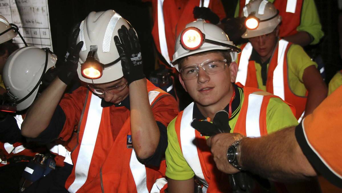 SWITCHED ON: Morisset High School year 10 students, including Sam Armitage, in the UGM Group's simulated mine on Friday. Picture: Jamieson Murphy