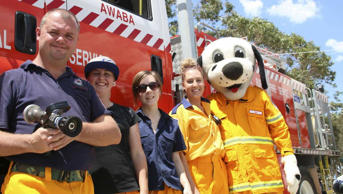 FLYING SOLO: The Awaba Rural Fire Service crew, with Solo, their mascot. Picture: Jamieson Murphy