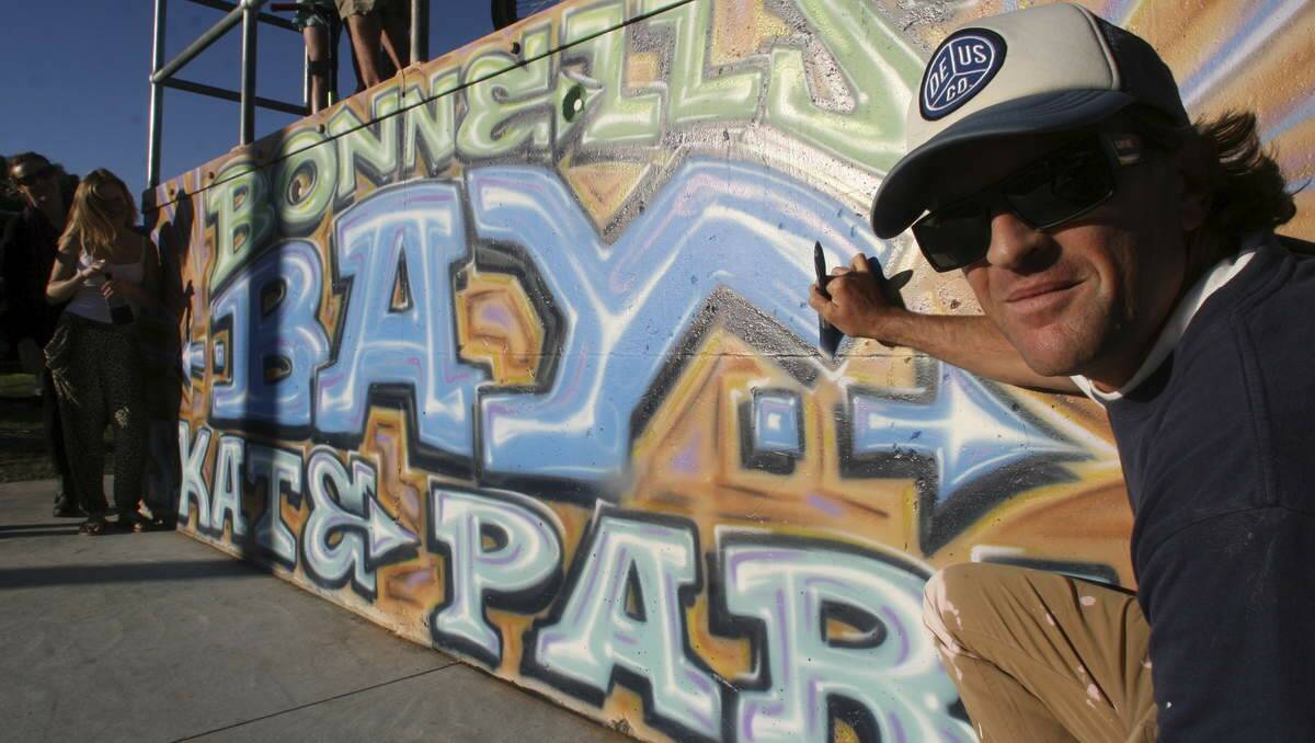 ART WORK: Artist Daniel Joyce at the Bonnells Bay skate park mural he created.