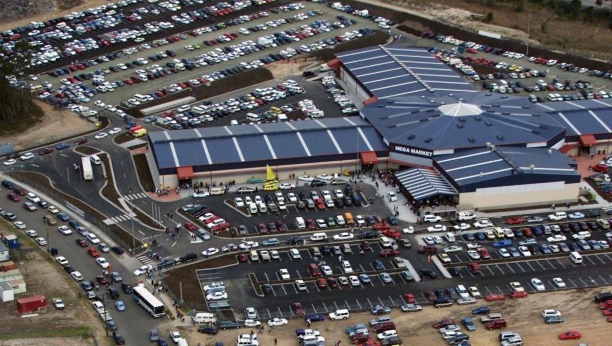 END OF ERA: This aerial picture of Morisset Mega Market shows the hive of activity it generated soon after opening 12 years ago. 