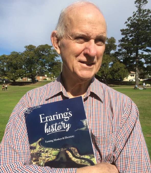 Forgotten suburb: Lake author Doug Saxon with his new book exploring Eraring's past from monkeys to a power plant. Picture: Mike Scanlon

