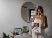 Kelly Kay with a photo of son Kahi Simon, who took his own life in October last year. Picture by Marina Neil 