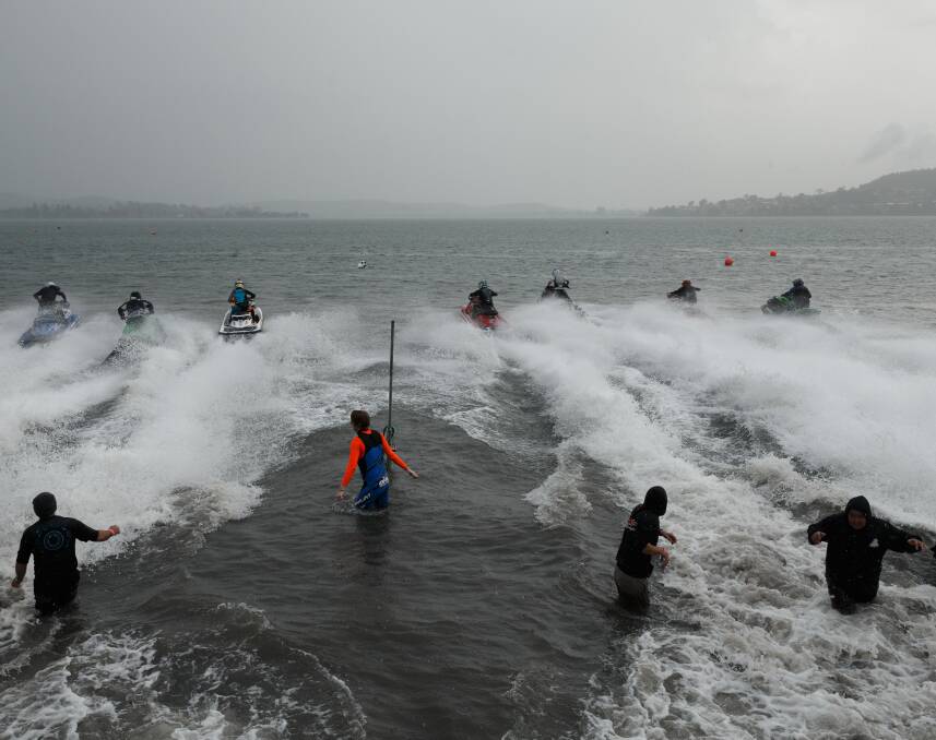 THEY'RE OFF: The field races towards the first turn in one of the runabout races during the Australian Watercross Championships at Lake Macquarie on Sunday. Picture: Max Mason-Hubers. 