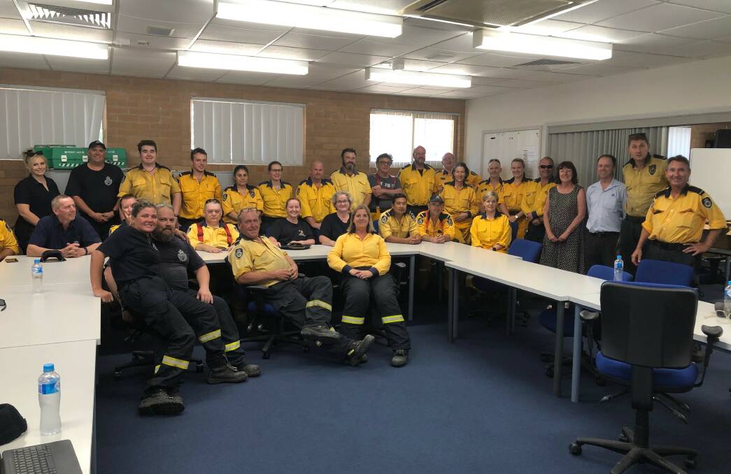 FORMIDABLE FORCE: Cr Fraser with the NSW RFS and volunteers from our community.