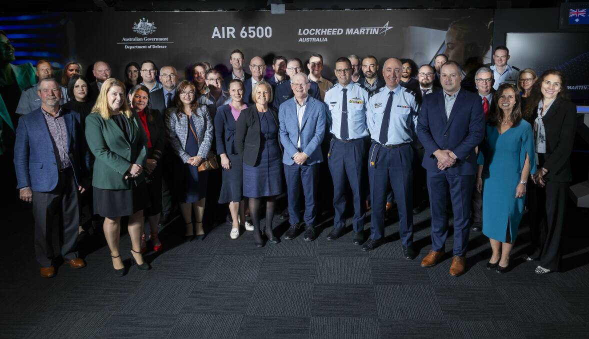 Defence members and Lockheed Martin Australia staff gather to acknowledge the enduring partnership which will support the delivery of the Joint Air Battle Management System (JABMS) project.