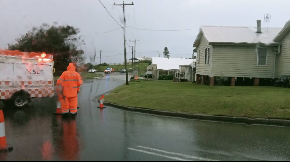 SES crews at the scene of a private dam overflow at Catherine Hill Bay on April 20. Picture supplied