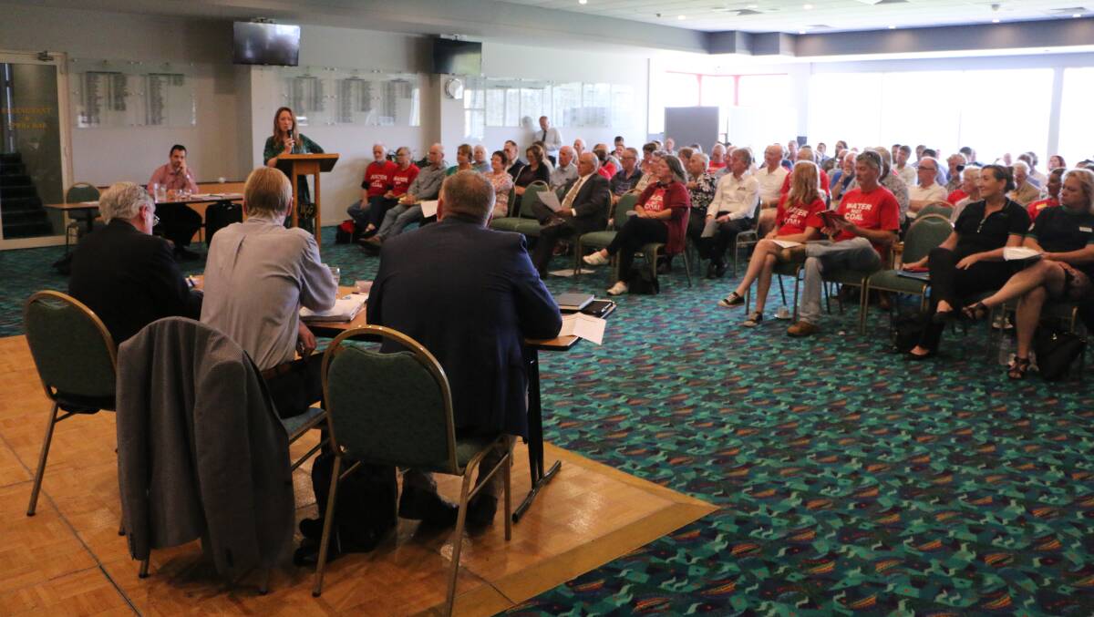 The NSW Planning Assessment Commission hears public submissions about the Wallarah 2 coal mine at a packed Wyong Golf Club last year. Picture: David Stewart