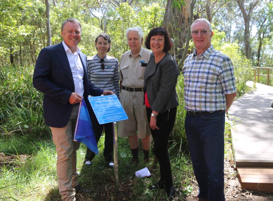 UPGRADE: Pictured at the boardwalk sign unveiling are, from left, federal MP Joel Fitzgibbon, Julie and Kelvin Ward, mayor Kay Fraser, and John Quinlan. Picture: Supplied