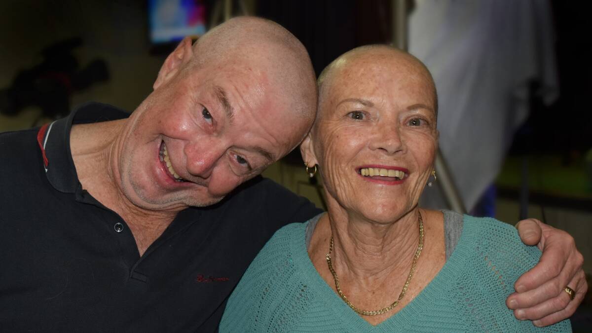 Liz and her husband Jeff Wright after having their heads shaved at Wangi RSL Club last year at a fund-raiser for Ovarian Cancer Australia. Picture by Ray Watts