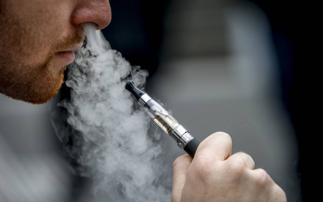 CLEAR THE AIR: The state government has banned the use of e-cigarettes in smoke-free areas such as schools, shopping centres, playgrounds and restaurants. Picture: Eddie Jim