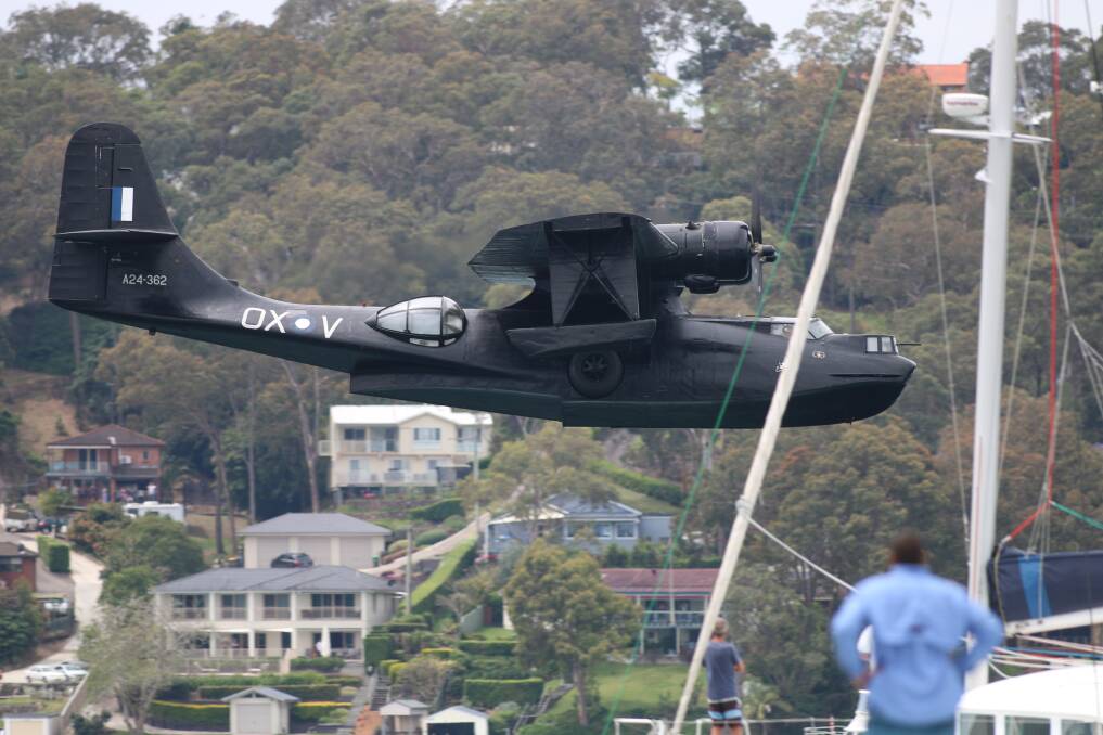SHOW STOPPER: Felix the Black Catalina performed a series of low passes that thrilled crowds at the Rathmines Catalina Festival in 2016. The big cat is scheduled to return to Lake Macquarie for this year's festival on May 19. Picture: David Stewart