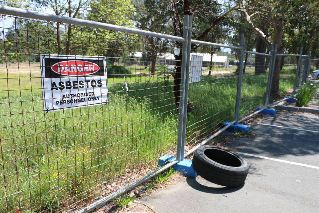 NO PLAY: The warning sign and fencing around the affected area of the popular park in Morisset. Picture: David Stewart
