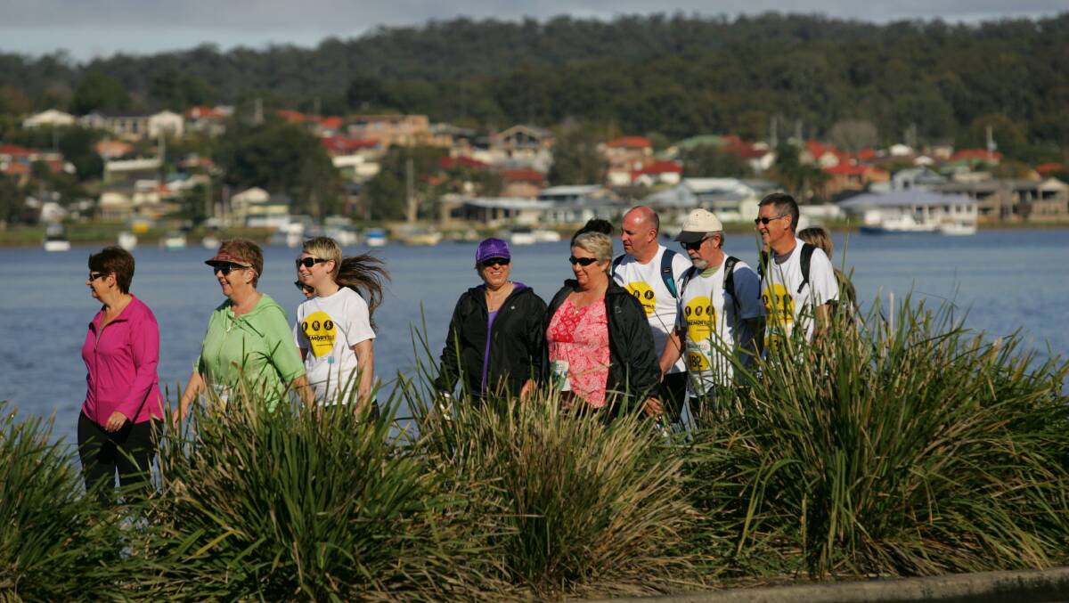 TAKE IT EASY: Participants in the Memory Walk and Jog at Speers Point. Dogs are welcome this year. Picture: Dean Osland