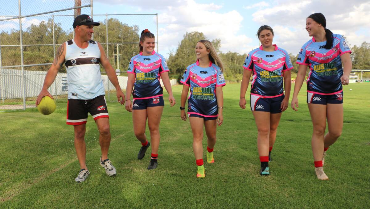 Coach Troy Agar with players Zoe Coyne, Courtney Whitehead, April Brown-Peters and Georgia Bragg at Neville Thompson Oval. Picture: David Stewart