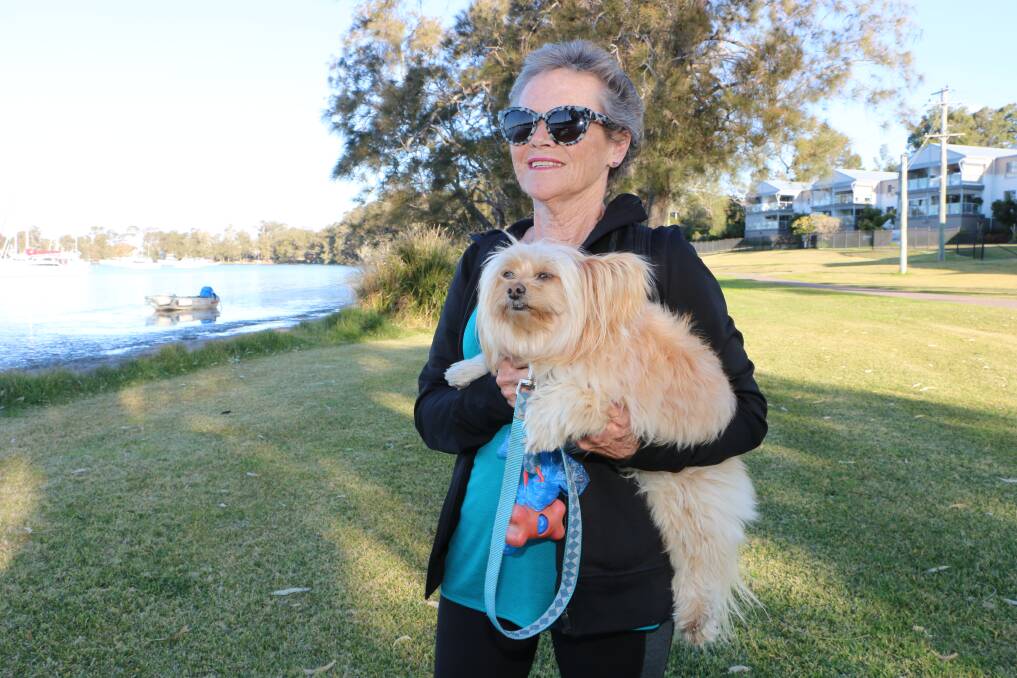 AWARENESS: Liz Wright, of Wangi Wangi, with her dog Evie in the lead-up to the Teal Sisters Walk at Warners Bay. Picture: David Stewart