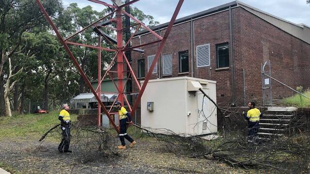 The workers cut grass and remove fallen branches and other potential fire hazards from the Telstra facilities. Picture: Supplied