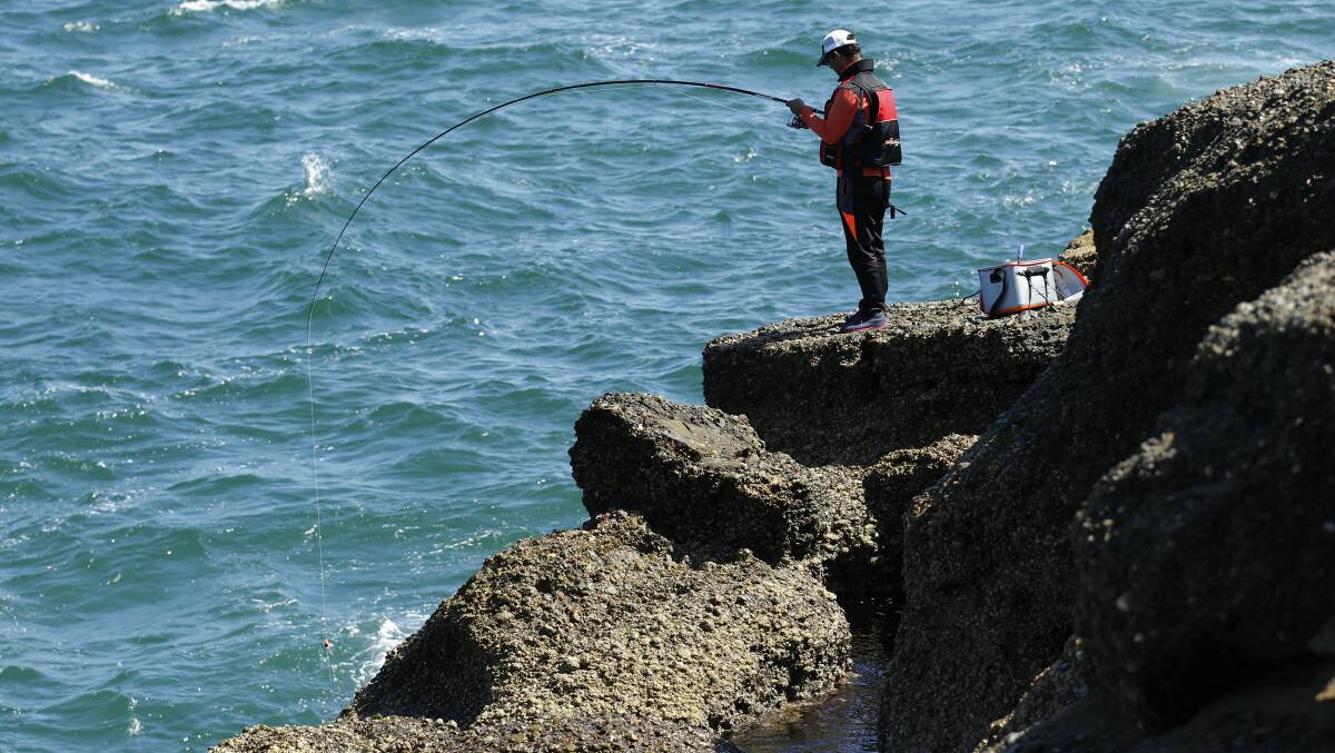 SNAPPER POINT: Central Coast Council said many rock fishers were already wearing life jackets, and the new rules and threat of $100 fines would only boost the safety of anglers. Picture: Max Mason-Hubers