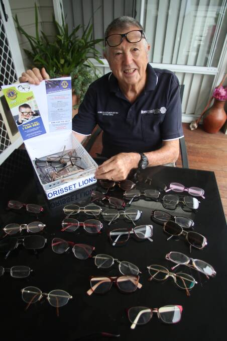 DE-CLUTTER: Morisset Lion Rod Garrett with one of the collection boxes he's set up around town for donated spectacles and sunglasses in the Lions Recycle for Sight program. Picture: David Stewart