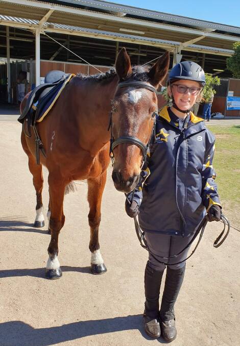 CHAMPION PAIRING: Saree Masterton, of Woongarrah, with her mount Condor. Saree won her showjumping competition. Picture: Supplied