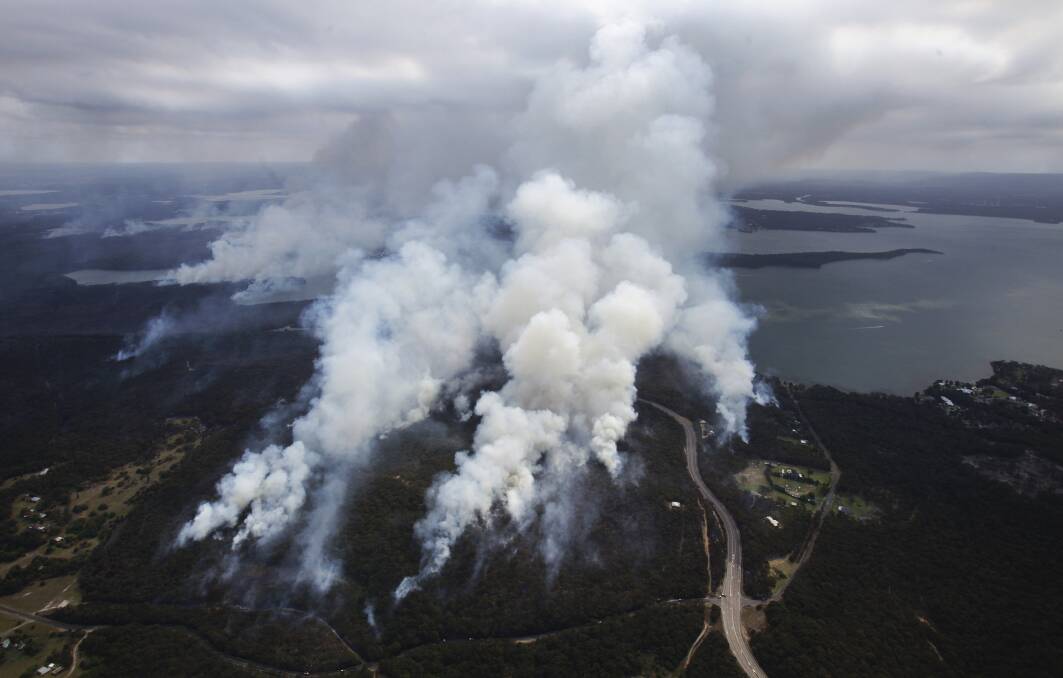 SMOKE: A reader says one major bushfire releases more carbon into the atmosphere than a power station does in a year. Picture: James Brickwood.