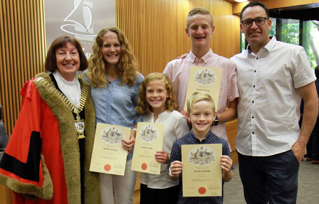 Mayor Kay Fraser congratulates Stacy Allen and her family, from left, Sydney, 9, Brett, 16, Samuel, 7, and husband Greg. Picture: Supplied