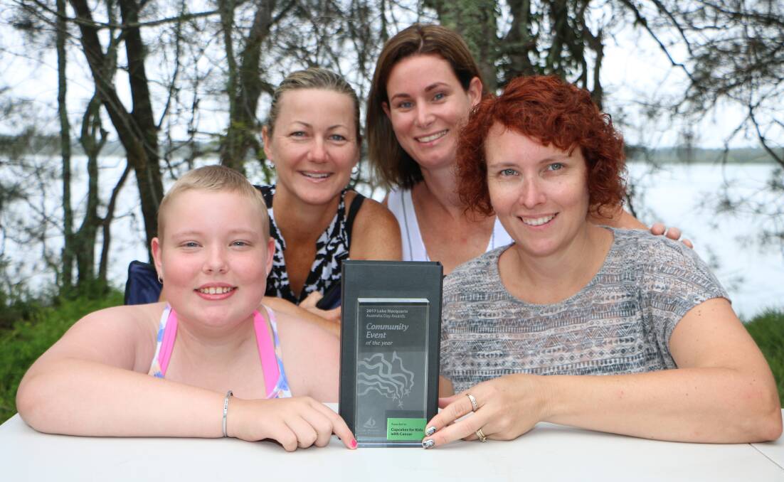 AIMING HIGH: Jacinta Gomez and her mum, Kirsten, with their Lake Macquarie City Council award for Community Event of the Year (for Cupcakes for Kids with Cancer), flanked by Theresa Blair, left, and Tracie Brown, on Australia Day. Picture: David Stewart