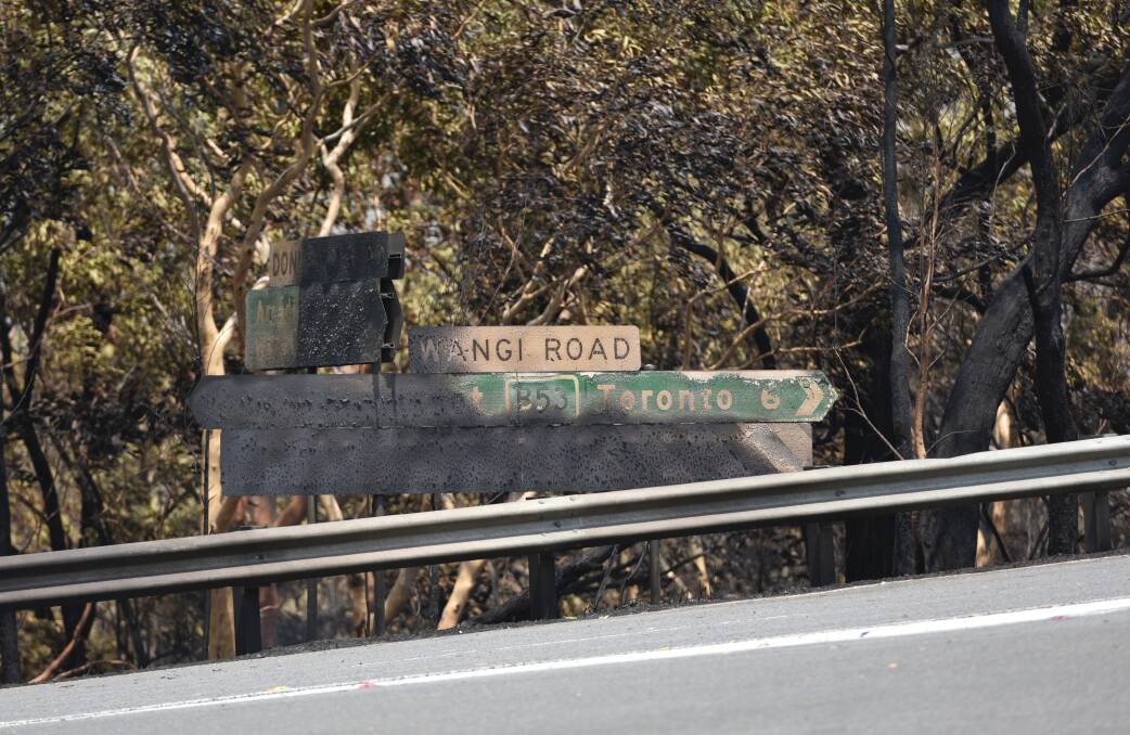 WANGI FIRE: Reader Steven Busch says trees should be cleared from the side of roads in isolated communities to maintain clear escape routes. Picture: Chris VanderSchaaf