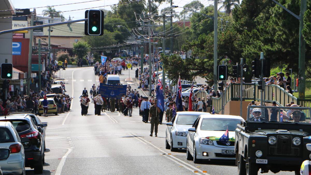 MORE LIGHTS: Dora Street on Anzac Day last year. The pedestrian crossing at the top of the picture, in the heart of the shopping strip, will be replaced by traffic lights. Picture: David Stewart