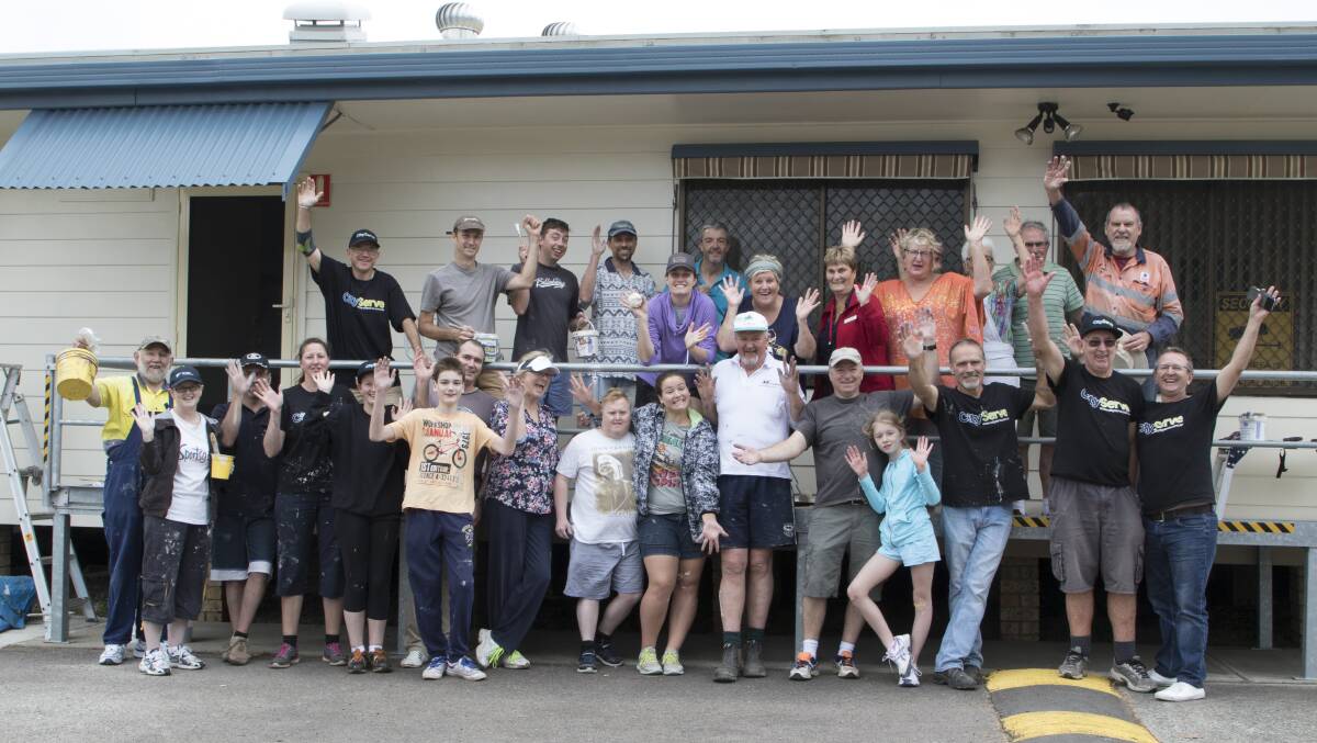 PAINT JOB: A section of the volunteers who helped to give the Toronto Meals on Wheels headquarters a makeover as part of the City Serve initiative. Picture: Supplied