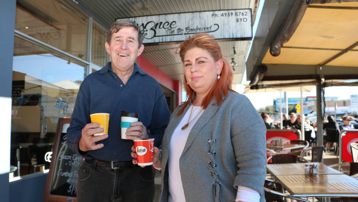 CHANGE: Steve Dewar with Rebecca Walsh at Essence Cafe, in Toronto, which now serves coffee in recyclable cups, and bring-your-own mugs. Picture: David Stewart