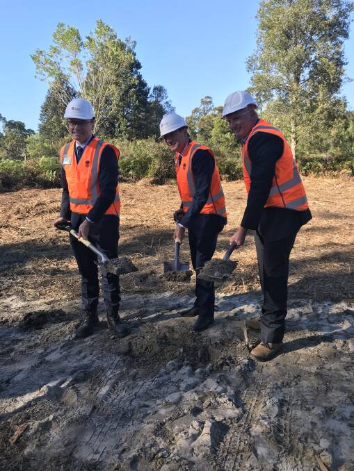 SOD TURNING: Scot MacDonald, centre, with Steve Tolley from the John Holland Group, left, and Andrew Mackay of Transport for NSW, at the Kangy Angy site. Picture: Supplied