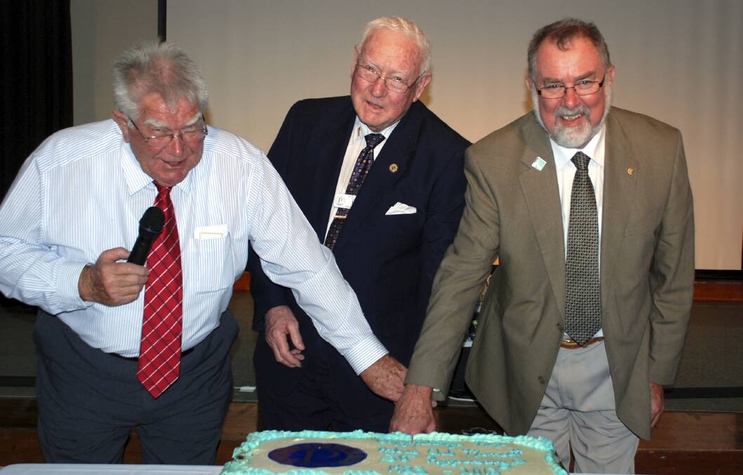 FOUNDER: Les Norris, centre, with Greg Riding, left, and John Olive at the 30th anniversary celebrations of Morisset Probus in 2013. Picture: Supplied