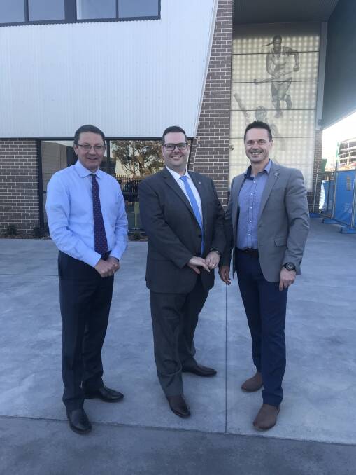 SITE INSPECTION: Parliamentary Secretary for the Hunter, Scot MacDonald, left, with Lake Macquarie City councillors Kevin Baker and Jason Pauling at the school this afternoon. Picture: Supplied
