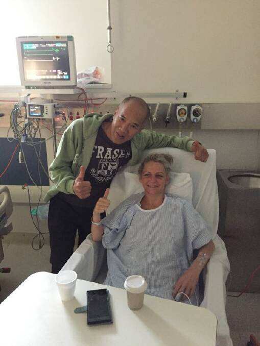 THUMBS UP: Dr Charlie Teo with Sarah Holden after her operation. Picture: Supplied