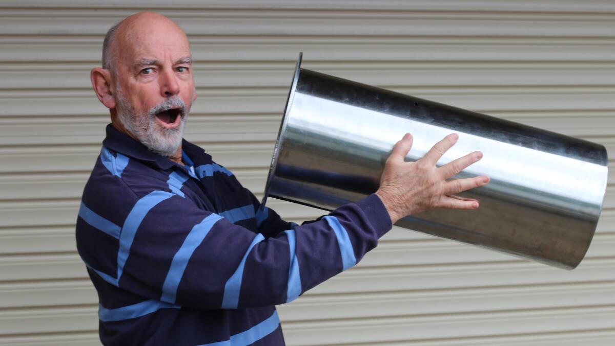 IMPRESSIVE: Murray Scoble having fun with the time capsule, when it was first revealed in The Lakes Mail last year. Picture: David Stewart