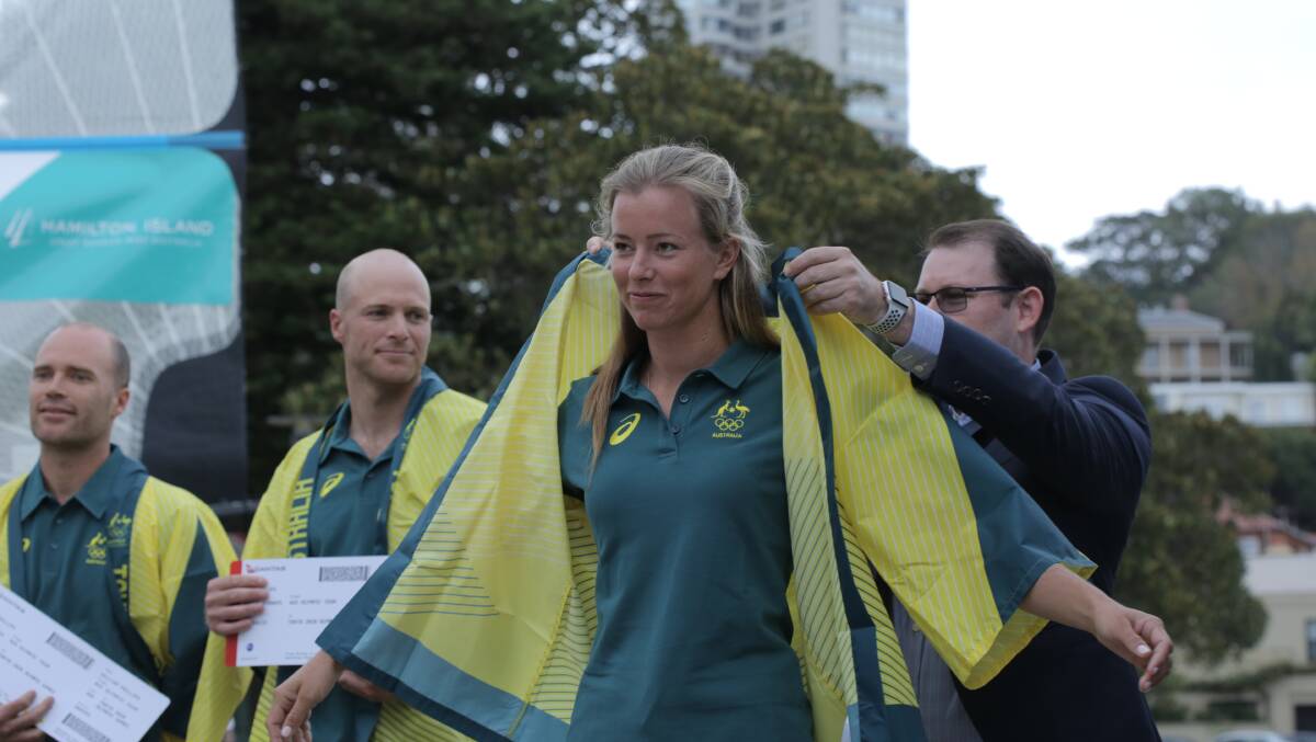 GOOD FIT: Jaime Ryan is presented with her Australian jacket on Thursday. Picture: Supplied.