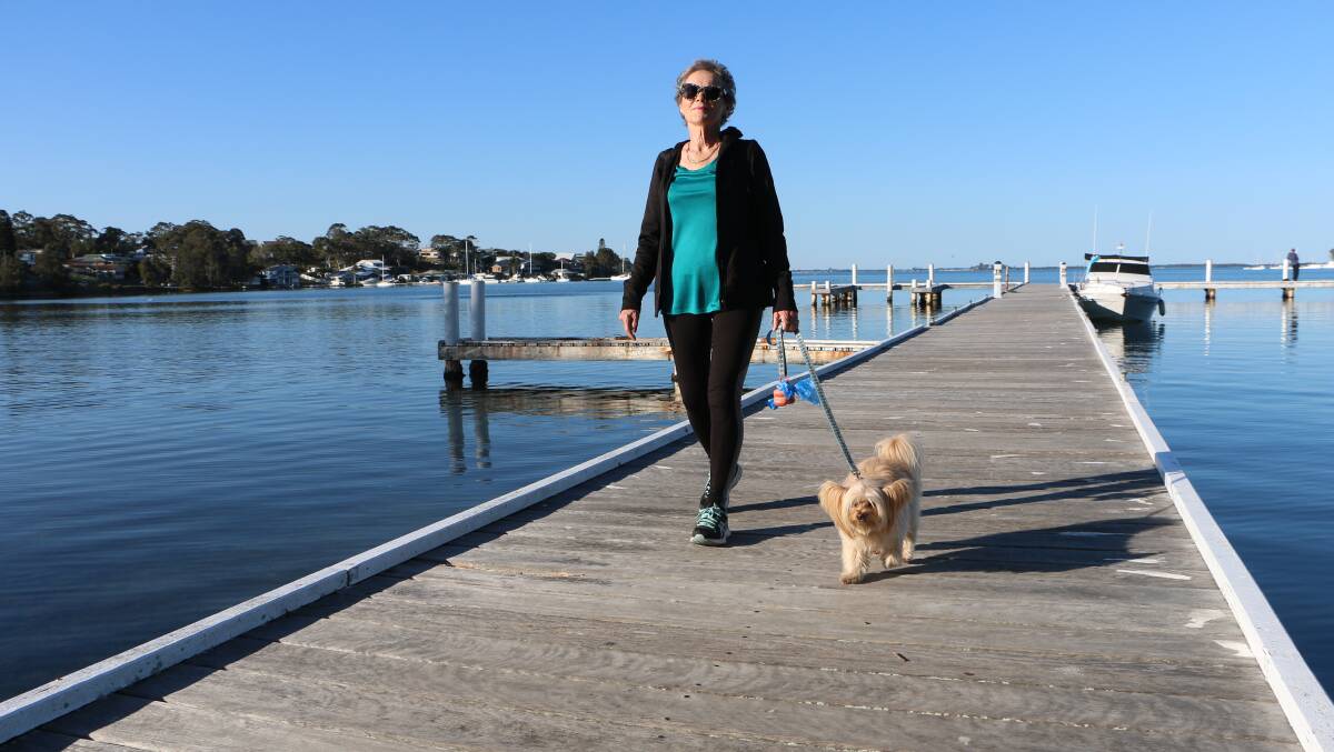 INVITATION: Liz Wright and her dog Evie in training at Wangi Wangi for the lakeside walk this Sunday, October 21, at Warners Bay. Picture: David Stewart