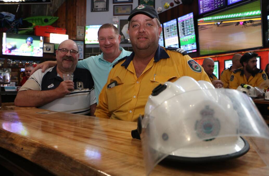 APPRECIATED: Peninsula Rural Fire Brigade captain Rob Bruinink with Bruce Clark, left, and publican Peter Cullen, at the Bay Hotel Motel on Thursday. Picture: David Stewart