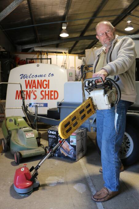 YOU CHOOSE: Ken Gladman with a selection of some of the many items that will be on offer at the garage sale at Wangi Men's Shed on Saturday. Picture: David Stewart